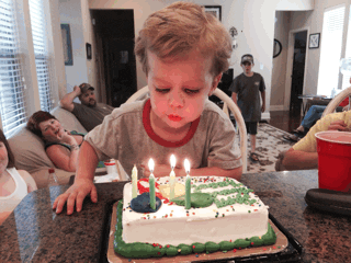 Cute Baby Blowing Cake GIF