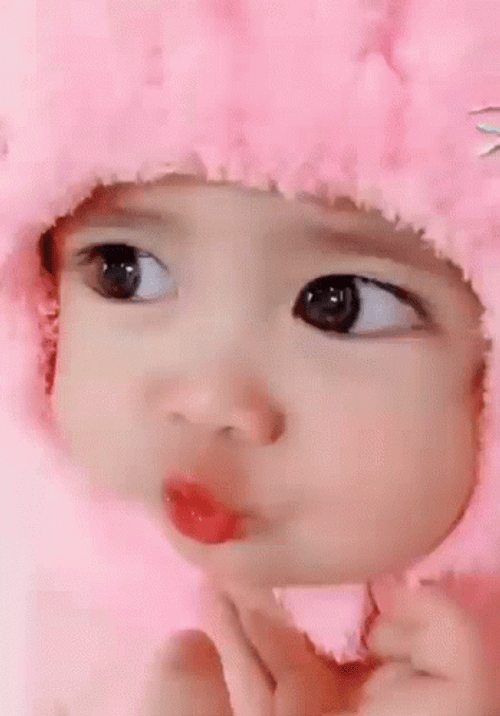 Cute Baby Girl In Pink Pouting GIF