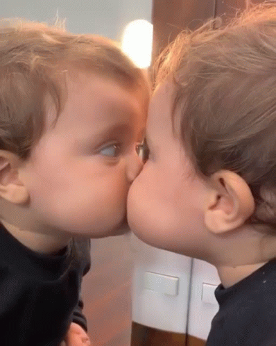 Cute Baby Kiss On Mirror Reflection GIF