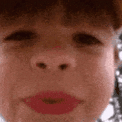 Cute Baby Spit To Camera GIF