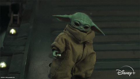 Cute Baby Yoda Sits Down GIF