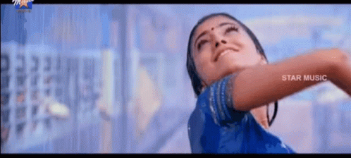 Cute Bollywood Couple Dancing In The Rain GIF