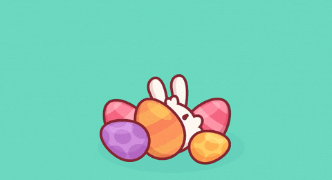 Cute Bunny Hopping In The Middle Of Eggs GIF