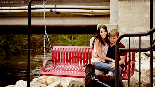 Cute Couples Sitting On The Swing GIF