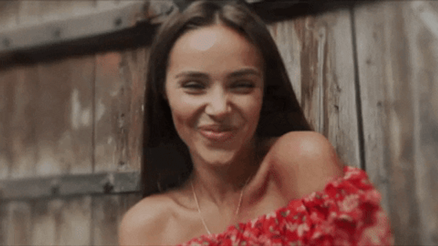 Cute Girl In Red Smiles GIF