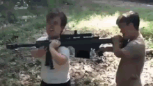 Cute Guys Firing A Big Gun GIF