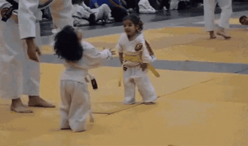 Cute Karate Kid Hug Fight GIF 