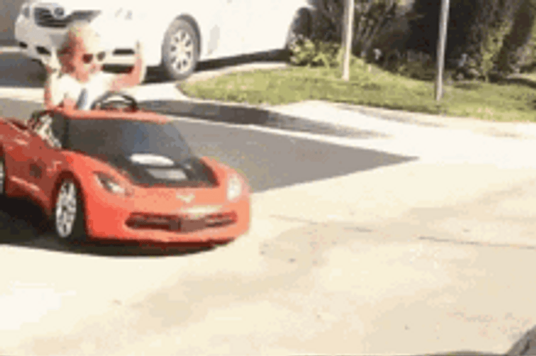 Cute Kid's Toy Car Drifting On The Road GIF
