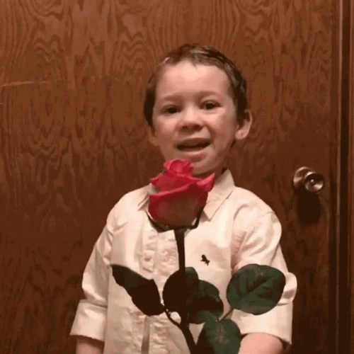 Cute Kid With Rose GIF