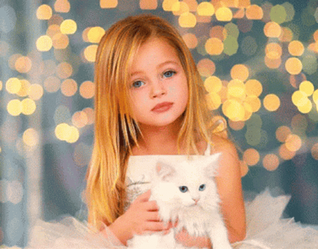 Cute Little Girl Holding A Cat GIF