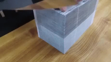 Cutting Paper Using Sharp Knife GIF