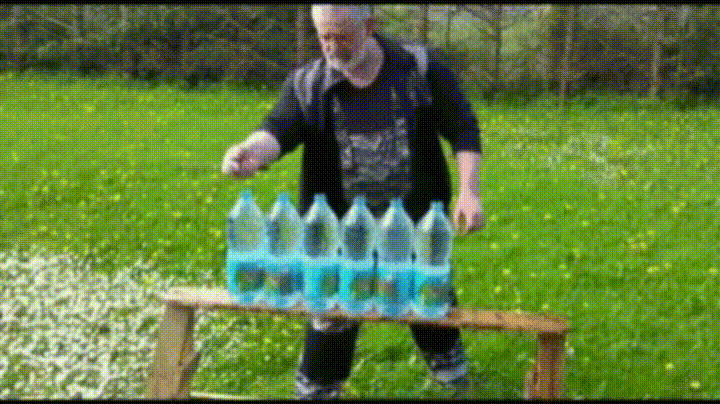 Cutting Water Bottles Using Sharp Knife GIF