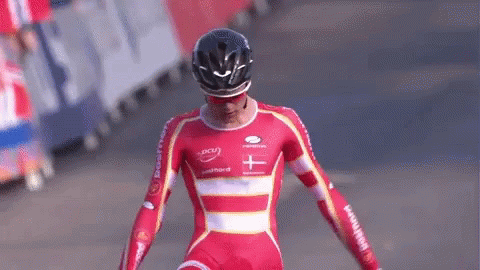 Cyclist Doing The Dab Pose GIF