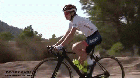 Cyclist Rock And Roll Pose GIF