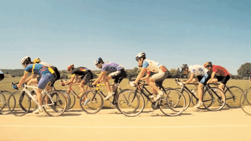 Cyclists Racing on Road