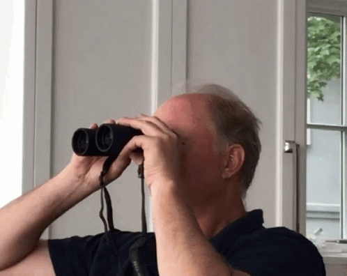 Dad Looking Thru Binoculars Close Up GIF