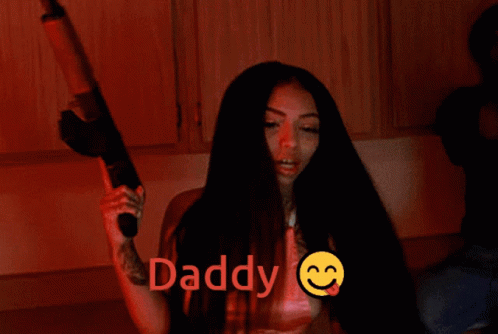 Girl With Gun Calls Daddy GIF