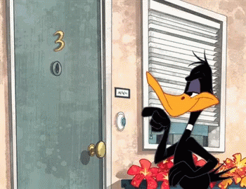 Daffy Duck In Front Of Door Number 3 GIF