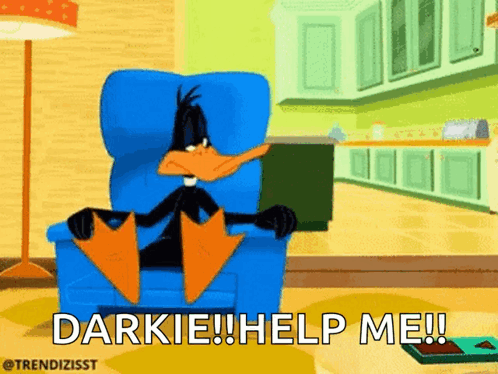 Daffy Duck Sitting in Chair Saying Darkie Help Me