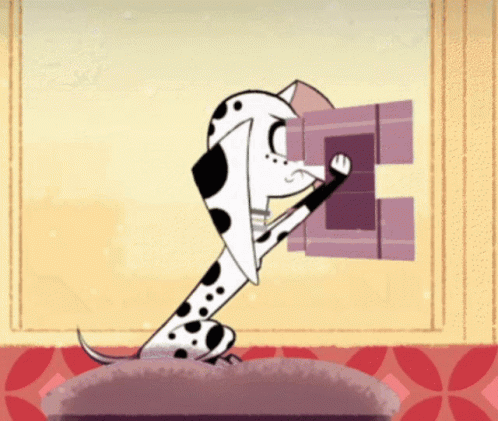 Dalmatian Dog Reading Book on Couch