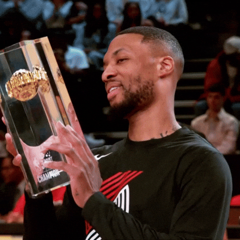 Damian Lillard Raising His Trophy GIF