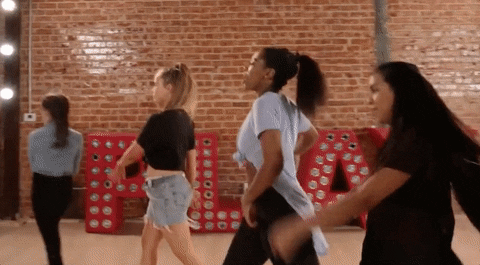 Dance Off Between Groups Of Girls And Guys GIF