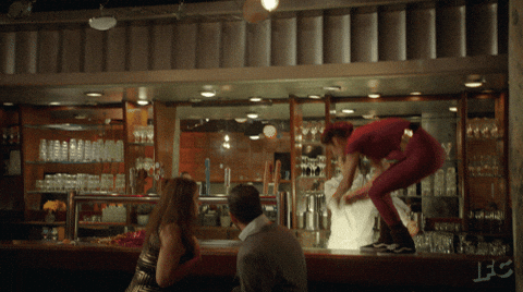 Dancing Above Bartender Counter GIF