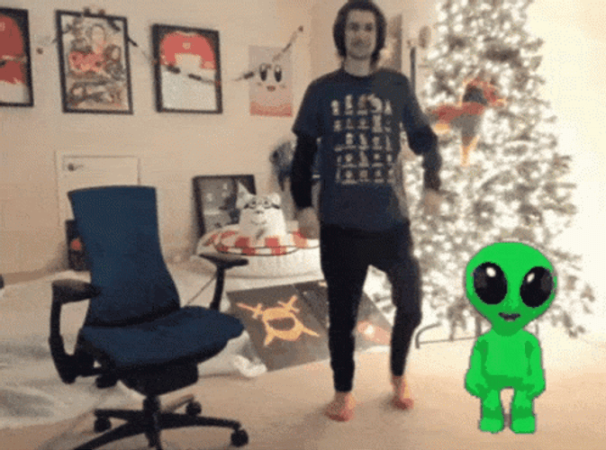 Dancing Baby Alien With A Man GIF