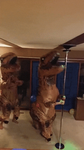 Dancing Dino Near Pole 2 Trex Mascot GIF