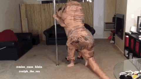 Dancing Dino Trex Mascot Pole Dancing GIF