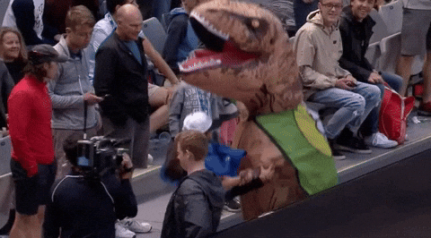 Dancing Dino Trex Mascot With Girl GIF