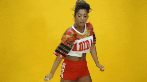 Dancing Girl In A Yellow Background GIF