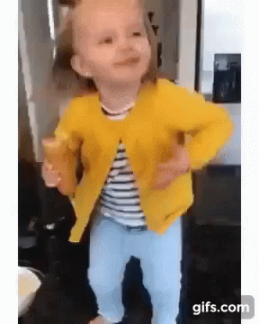 Dancing Girl In A Yellow Jacket GIF