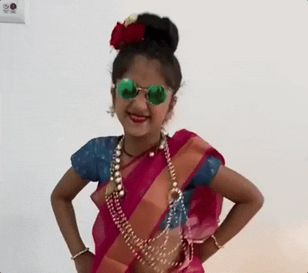 Dancing Girl Little Girl In Traditional Costume And Shades GIF