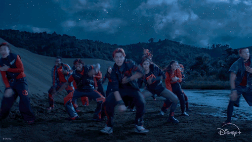 Dancing Group in Blue Sky with Disney Logo