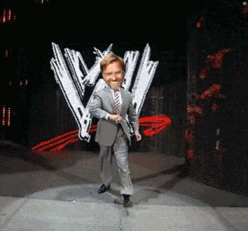 Dancing Man in Suit and Tie Before W Logo