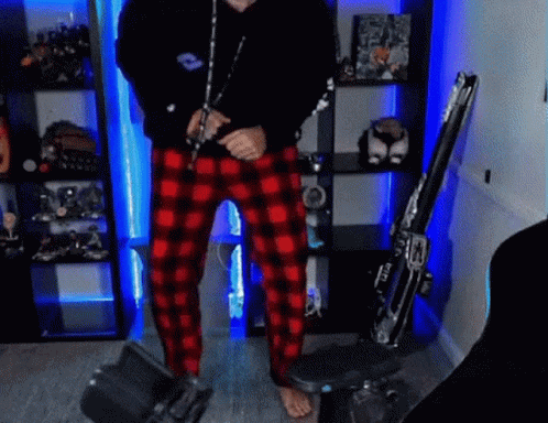 Dancing Man Wearing Checkered Pants GIF