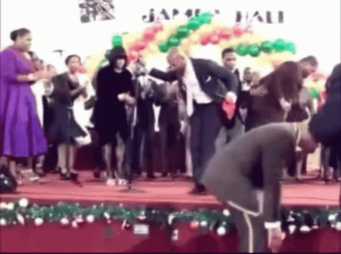 Dancing on Stage at Japan Hall With Balloons