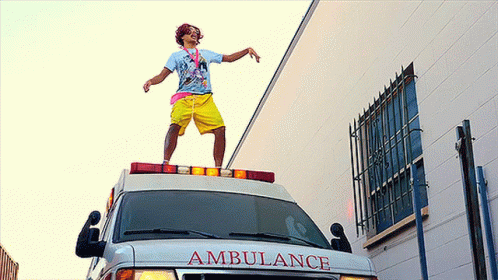 Dancing On Top Of An Ambulance GIF