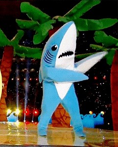 Dancing Shark Mascot On The Stage GIF