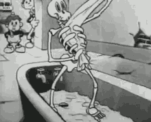Dancing Skeleton Cleaning Bathtub GIF