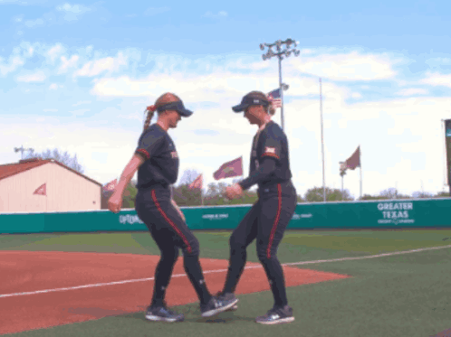 Dancing Softball Players on Greater Texas Field