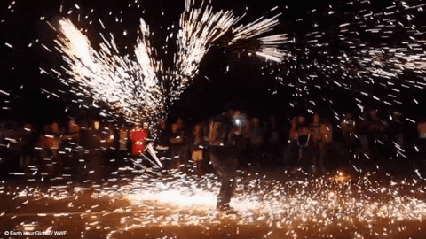 Dancing With Whirling Sparklers GIF