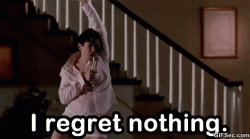 Dancing Woman Saying I Regret Nothing GIF