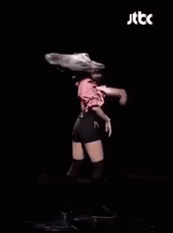 Dancing Woman With Microphone Pink Shirt Black Shorts GIF