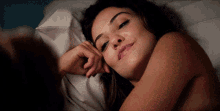 Danielle Campbell Smiling In Bed GIF