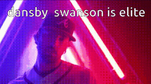 Dansby Swanson Is Elite Is Written Above A Man In A Baseball Cap GIF