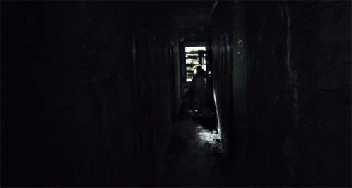 Dark Hallway With Light From Door