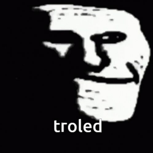 Dark Humor Troll Face Sinister Grin GIF