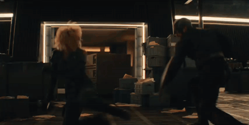Dark Room With Boxes On Table GIF
